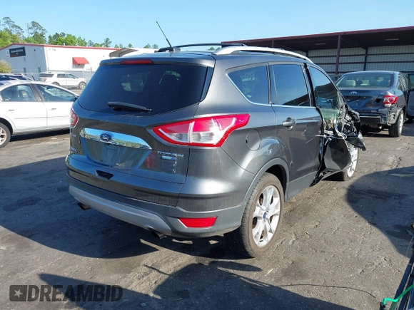 2016 Ford Escape Titanium with VIN 1FMCU9J94GUA63359, listed as a IAAI auction lot 41954514 with 94,315 mi miles. Bid and sale history available at carsss.com. Image 4.
