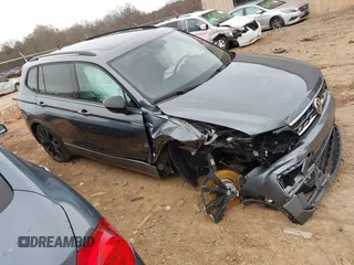 2020 Volkswagen Tiguan SE with VIN 3VV3B7AX7LM163193, listed as a IAAI auction lot 41751571 with 32,352 mi miles and . Bid and sale history available at DreamBid. Image 1.