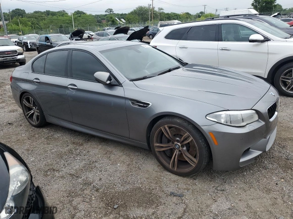 2014 BMW M5 with VIN WBSFV9C52ED593120, listed as a Copart auction lot 64427394 with 80,546 mi miles and Clean Title. Bid and sale history available at carsss.com. Image 4.