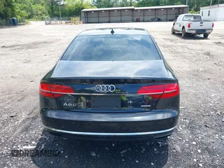 2015 Audi A8 3.0T with VIN WAU3GAFD6FN008993, listed as a IAAI auction lot 42239421 with 125,587 mi miles and . Bid and sale history available at DreamBid. Image 16.