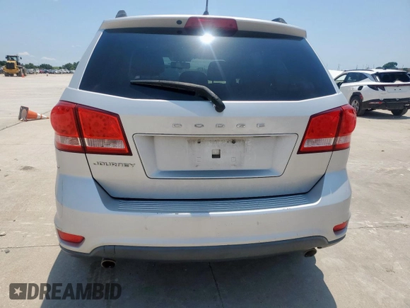 2012 Dodge Journey SXT with VIN 3C4PDCBG1CT134375, listed as a Copart auction lot 61059305 with 165,913 mi miles and Salvage title. Bid and sale history available at DreamBid. Image 6.