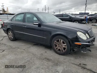 2003 Mercedes-Benz E-Class 3.2L with VIN WDBUF65J03A313146, listed as a Copart auction lot 48976185 with 258,237 mi miles and Salvage Title. Bid and sale history available at carsss.com. Image 4.