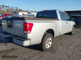 2004 Nissan Titan XE with VIN 1N6AA06A34N579377, listed as a IAAI auction lot 41725829 with 220,777 mi miles. Bid and sale history available at carsss.com. Image 4.