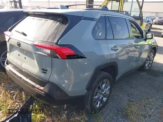 2023 Toyota RAV4 XLE Premium z VIN JTMA1RFV7PJ041609, wystawiony jako IAAI lot #41861931 z przebiegiem 18 862 mil mil oraz . Historia ofert i sprzedaży dostępna na DreamBid. Obrazek 4.