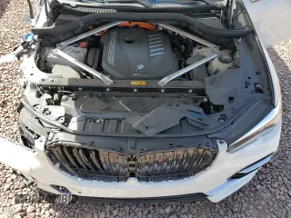 2023 BMW X5 xDrive45e z VIN 5UXTA6C02P9N98430, wystawiony jako Copart lot #51509085 z przebiegiem 24 093 mil mil oraz Szkoda całkowita • Salvage title. Historia ofert i sprzedaży dostępna na DreamBid. Obrazek 13.