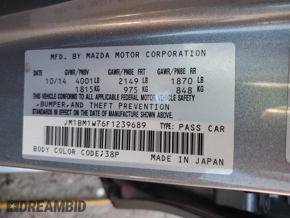 2015 Mazda 3 i Grand Touring z VIN JM1BM1W76F1239689, wystawiony jako Copart lot #55343985 z przebiegiem 14 789 mil mil oraz Szkoda całkowita • Salvage title. Historia ofert i sprzedaży dostępna na DreamBid. Obrazek 12.