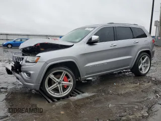 2014 Jeep Grand Cherokee Overland with VIN 1C4RJECG9EC341865, listed as a Copart auction lot 44354615 with 141,601 mi miles and Salvage Title. Bid and sale history available at carsss.com. Image 1.