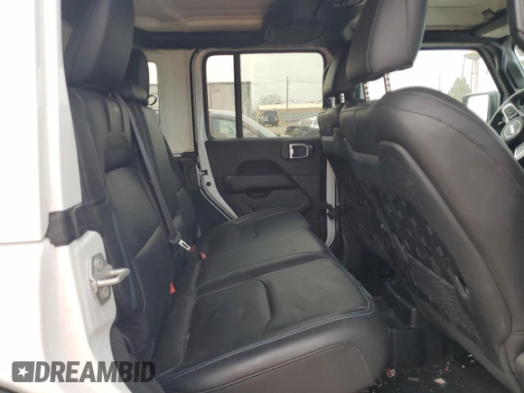 2023 Jeep Wrangler Rubicon z VIN 1C4JJXR6XPW663181, wystawiony jako Copart lot #49799125 z przebiegiem 8 085 mil mil oraz Szkoda całkowita • Salvage title. Historia ofert i sprzedaży dostępna na DreamBid. Obrazek 10.