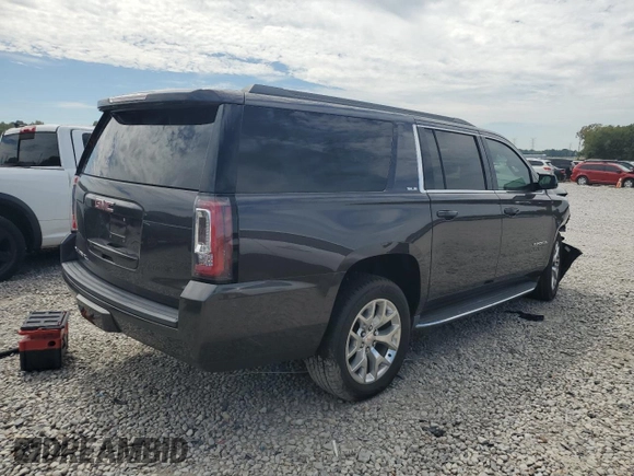 2015 GMC Yukon XL SLE z VIN 1GKS1GKC2FR625157, wystawiony jako Copart lot #69628124 z przebiegiem 153 022 mil mil oraz Szkoda całkowita • Salvage title. Historia ofert i sprzedaży dostępna na DreamBid. Obrazek 3.