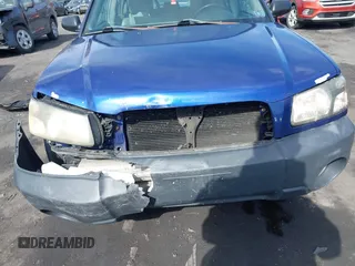 2003 Subaru Forester X with VIN JF1SG63633H748955, listed as a IAAI auction lot 41681834 with 236,196 mi miles. Bid and sale history available at carsss.com. Image 6.