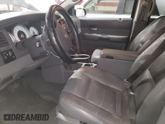 2004 Dodge Durango SLT z VIN 1D4HD48N04F216824, wystawiony jako Copart lot #87756545 z przebiegiem Nie podano mil oraz Nie do naprawy • Non repairable. Historia ofert i sprzedaży dostępna na DreamBid. Obrazek 7.