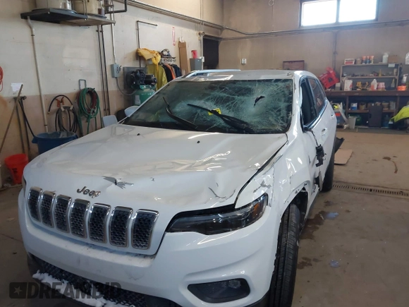 2020 Jeep Cherokee Altitude with VIN 1C4PJMLN6LD647106, listed as a IAAI auction lot 41406440 with 58,788 mi miles. Bid and sale history available at carsss.com. Image 6.