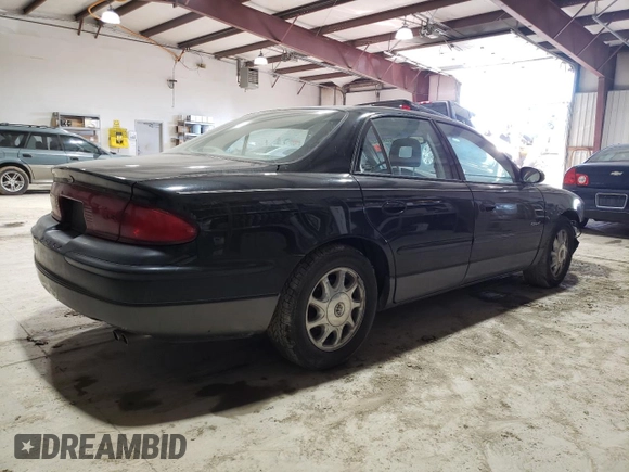 1999 Buick Regal GS with VIN 2G4WF5219X1424704, listed as a Copart auction lot 42899215 with 137,744 mi miles and Salvage Title. Bid and sale history available at carsss.com. Image 3.