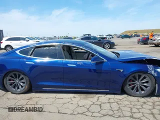 2017 Tesla Model S 100D with VIN 5YJSA1E44HF220391, listed as a IAAI auction lot 37381201 with Not Provided miles and . Bid and sale history available at DreamBid. Image 13.