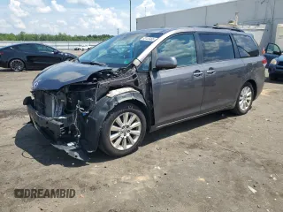 2011 Toyota Sienna XLE AAS with VIN 5TDYK3DC4BS022831, listed as a Copart auction lot 63123465 with 263,404 mi miles and Salvage title. Bid and sale history available at DreamBid. Image 1.