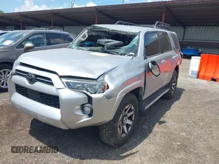 2020 Toyota 4Runner SR5 with VIN JTEBU5JR6L5807164, listed as a IAAI auction lot 42687254 with 127,825 mi miles and . Bid and sale history available at DreamBid. Image 2.