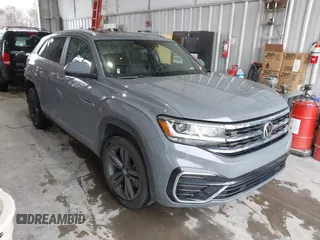 2021 Volkswagen Atlas SE with VIN 1V2PE2CAXMC209510, listed as a IAAI auction lot 41547821 with 61,033 mi miles and . Bid and sale history available at DreamBid. Image 1.