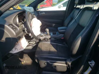 2018 Jeep Grand Cherokee Laredo E with VIN 1C4RJFAG5JC487487, listed as a Copart auction lot 61838185 with 54,297 mi miles and Salvage title. Bid and sale history available at DreamBid. Image 7.