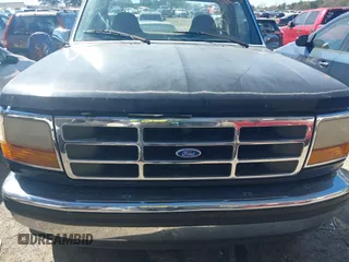 1995 Ford F-150 with VIN 1FTEF14N6SLB97371, listed as a IAAI auction lot 41833883 with 156,408 mi miles. Bid and sale history available at carsss.com. Image 6.