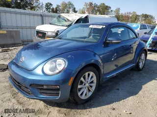 2018 Volkswagen Beetle S with VIN 3VWFD7AT4JM700857, listed as a Copart auction lot 76125604 with 75,560 mi miles and Salvage Title. Bid and sale history available at carsss.com. Image 1.