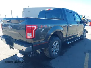 2015 Ford F-150 XLT with VIN 1FTEW1EG4FFC84691, listed as a IAAI auction lot 41651229 with 144,784 mi miles. Bid and sale history available at carsss.com. Image 4.