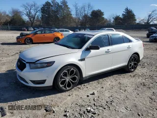 2013 Ford Taurus SHO with VIN 1FAHP2KT1DG211566, listed as a Copart auction lot 82433574 with 157,649 mi miles and Salvage title. Bid and sale history available at DreamBid. Image 1.