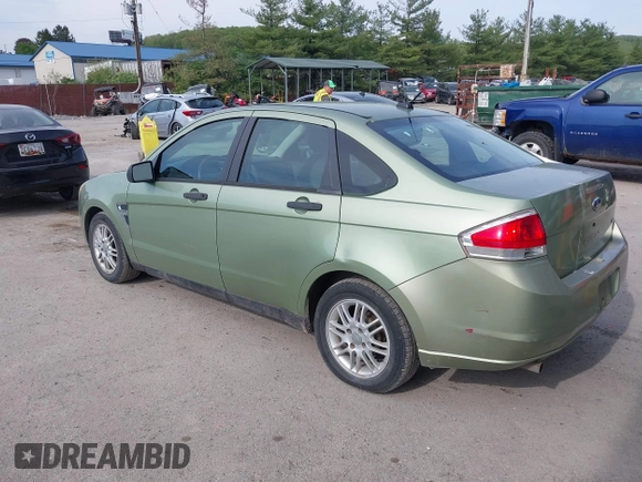 2008 Ford Focus SE with VIN 1FAHP35N58W116555, listed as a IAAI auction lot 42160091 with 162,592 mi miles. Bid and sale history available at carsss.com. Image 3.