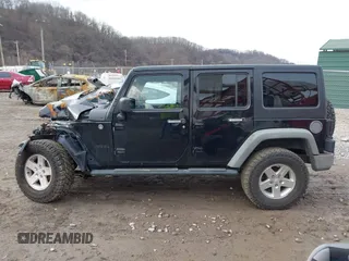 2011 Jeep Wrangler Unlimited Sport with VIN 1J4BA3H17BL552319, listed as a IAAI auction lot 41747031 with 120,751 mi miles. Bid and sale history available at carsss.com. Image 15.