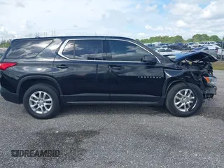 2021 Chevrolet Traverse LS z VIN 1GNERFKW3MJ268502, wystawiony jako IAAI lot #41697810 z przebiegiem 36 894 mil mil oraz . Historia ofert i sprzedaży dostępna na DreamBid. Obrazek 14.