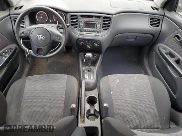 2010 Kia Rio LX with VIN KNADH4A37A6665399, listed as a Copart auction lot 72571284 with 132,610 mi miles and Salvage Title. Bid and sale history available at DreamBid. Image 8.