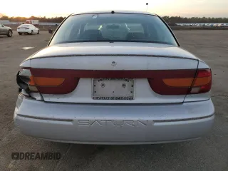 2001 Saturn SL z VIN 1G8ZK52761Z204012, wystawiony jako Copart lot #86618384 z przebiegiem 99 674 mil mil oraz Szkoda całkowita • Salvage title. Historia ofert i sprzedaży dostępna na DreamBid. Obrazek 6.