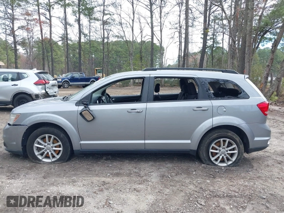 2015 Dodge Journey SXT with VIN 3C4PDCBG5FT696882, listed as a IAAI auction lot 41848362 with 175,039 mi miles and . Bid and sale history available at DreamBid. Image 14.