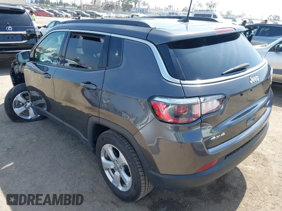 2019 Jeep Compass Latitude with VIN 3C4NJDBB8KT729491, listed as a IAAI auction lot 42489691 with 73,022 mi miles and . Bid and sale history available at DreamBid. Image 3.