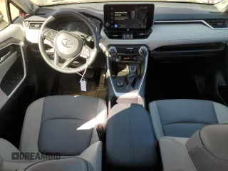 2024 Toyota RAV4 Hybrid XLE Premium with VIN JTMB6RFVXRD120389, listed as a Copart auction lot 47596985 with 16,956 mi miles and Salvage Title. Bid and sale history available at DreamBid. Image 8.