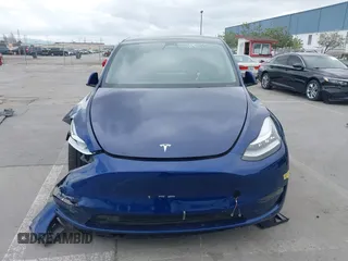 2022 Tesla Model Y Long Range with VIN 7SAYGDEE6NF480146, listed as a IAAI auction lot 41906361 with 31,939 mi miles and . Bid and sale history available at carsss.com. Image 12.
