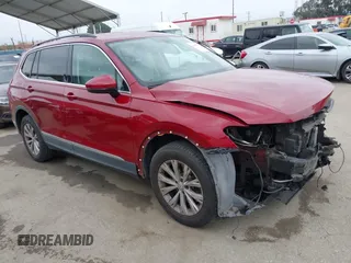 2018 Volkswagen Tiguan SEL with VIN 3VV3B7AX9JM031453, listed as a IAAI auction lot 42084781 with 82,931 mi miles and . Bid and sale history available at DreamBid. Image 1.