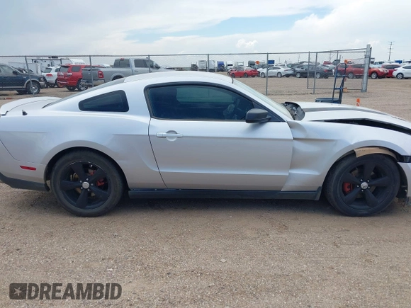 2012 Ford Mustang Premium with VIN 1ZVBP8AMXC5285458, listed as a IAAI auction lot 42162248 with 159,841 mi miles and . Bid and sale history available at DreamBid. Image 14.