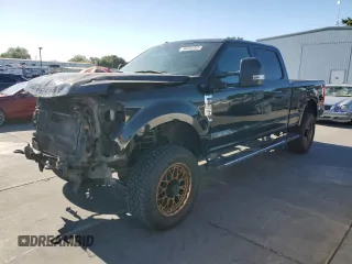 2018 Ford F-250 XL with VIN 1FT7W2BT1JEC25743, listed as a Copart auction lot 56203205 with 74,385 mi miles and Salvage title. Bid and sale history available at DreamBid. Image 1.