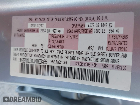 2018 Mazda 3 Touring with VIN 3MZBN1L31JM163466, listed as a IAAI auction lot 40777124 with 101,497 mi miles and . Bid and sale history available at carsss.com. Image 9.