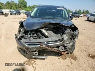 2016 Ford Escape Titanium with VIN 1FMCU9J98GUB32375, listed as a Copart auction lot 59564885 with 123,548 mi miles and Salvage title. Bid and sale history available at DreamBid. Image 14.
