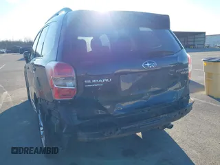 2015 Subaru Forester 2.5i Touring with VIN JF2SJAUC2FH827235, listed as a IAAI auction lot 41692229 with 182,123 mi miles. Bid and sale history available at carsss.com. Image 6.