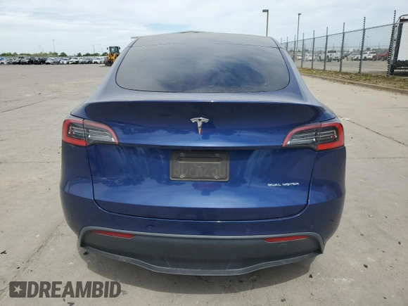 2021 Tesla Model Y Long Range with VIN 5YJYGDEE3MF094165, listed as a Copart auction lot 52907835 with 141,260 mi miles and Salvage Title. Bid and sale history available at DreamBid. Image 6.