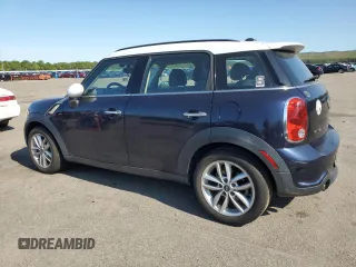 2013 MINI Countryman S with VIN WMWZC3C56DWP23892, listed as a Copart auction lot 58837985 with 98,988 mi miles and Clean title. Bid and sale history available at DreamBid. Image 2.