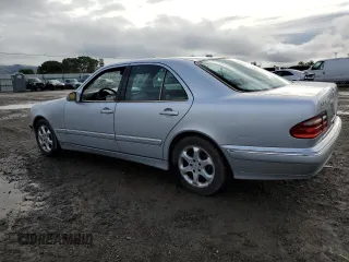 2002 Mercedes-Benz E-Class with VIN WDBJF65J22B464517, listed as a Copart auction lot 82488204 with 217,069 mi miles and Salvage Title. Bid and sale history available at carsss.com. Image 2.