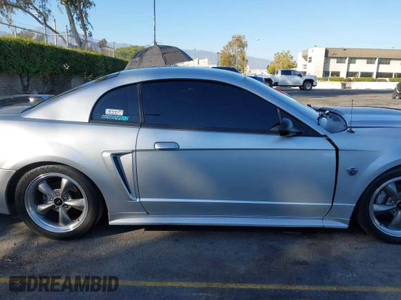 2004 Ford Mustang Standard with VIN 1FAFP40434F100991, listed as a IAAI auction lot 40706520 with 93,130 mi miles. Bid and sale history available at carsss.com. Image 13.
