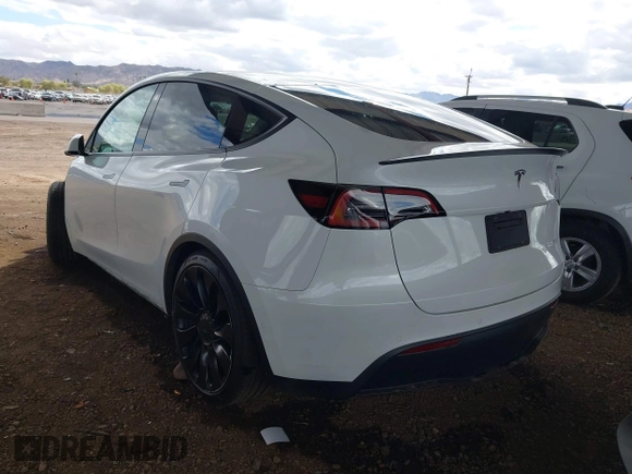 2022 Tesla Model Y Performance with VIN 7SAYGDEF4NF449986, listed as a IAAI auction lot 41754916 with 64,384 mi miles and . Bid and sale history available at DreamBid. Image 3.