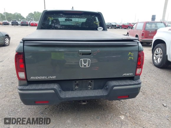 2018 Honda Ridgeline RTL-T with VIN 5FPYK3F61JB013733, listed as a IAAI auction lot 42548122 with 92,407 mi miles and . Bid and sale history available at DreamBid. Image 16.