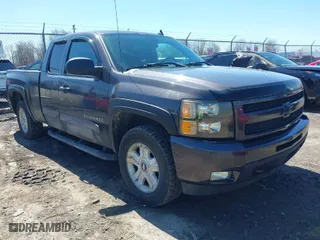 2011 Chevrolet Silverado 1500 LT with VIN 1GCRKSE35BZ102876, listed as a IAAI auction lot 42034079 with 208,956 mi miles. Bid and sale history available at carsss.com. Image 1.