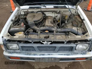 1997 Nissan Frontier XE with VIN 1N6SD16S8VC426940, listed as a Copart auction lot 55860235 with 242,265 mi miles and Salvage title. Bid and sale history available at DreamBid. Image 11.