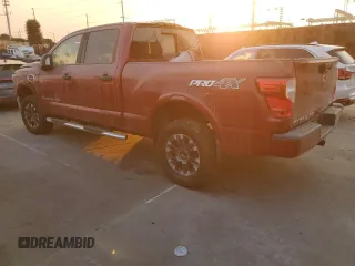 2016 Nissan Titan SL with VIN 1N6BA1F46GN516606, listed as a Copart auction lot 54073565 with 38,097 mi miles and Salvage title. Bid and sale history available at DreamBid. Image 2.